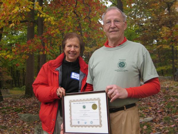 Ann Gruhn presents Walt Daniels with Honorary Life Membership